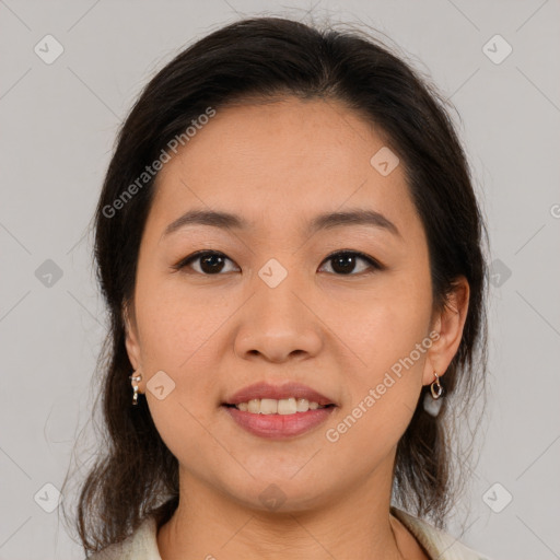 Joyful latino young-adult female with medium  brown hair and brown eyes