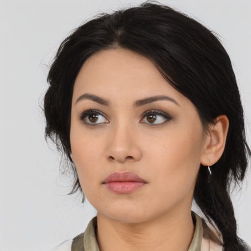 Neutral asian young-adult female with medium  black hair and brown eyes