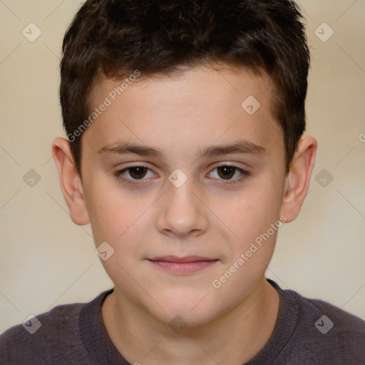 Joyful white child male with short  brown hair and brown eyes