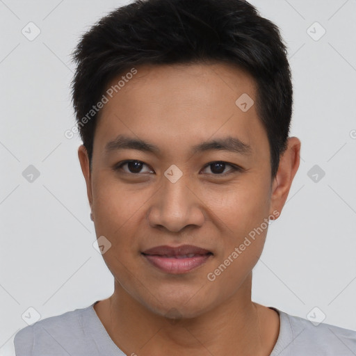 Joyful asian young-adult male with short  black hair and brown eyes