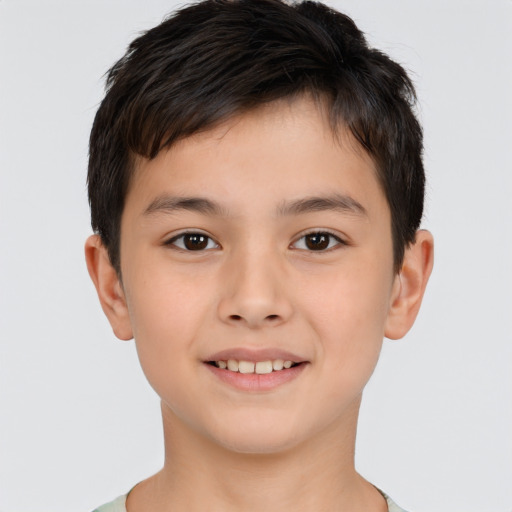 Joyful white child male with short  brown hair and brown eyes
