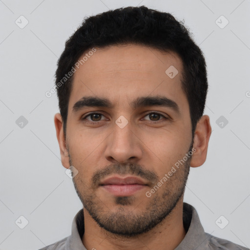 Neutral latino young-adult male with short  black hair and brown eyes