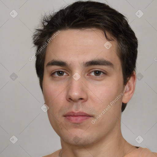 Neutral white young-adult male with short  brown hair and brown eyes