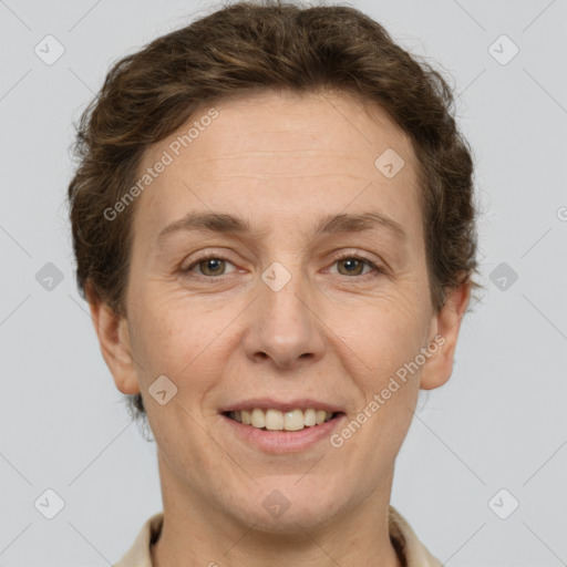 Joyful white adult female with short  brown hair and grey eyes