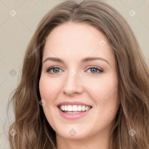 Joyful white young-adult female with long  brown hair and green eyes