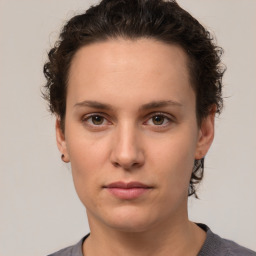 Neutral white young-adult female with short  brown hair and brown eyes