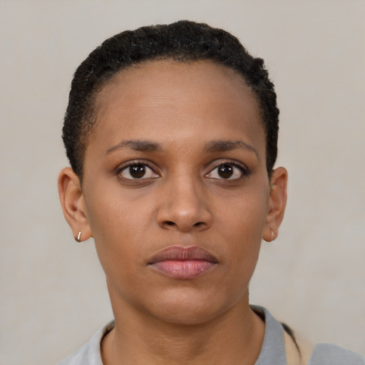 Neutral black young-adult female with short  brown hair and brown eyes