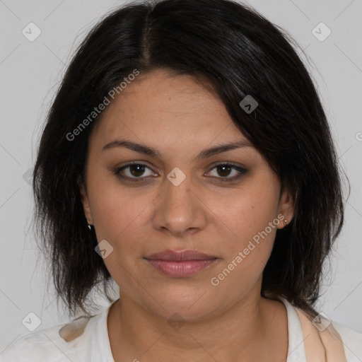 Joyful latino young-adult female with medium  brown hair and brown eyes