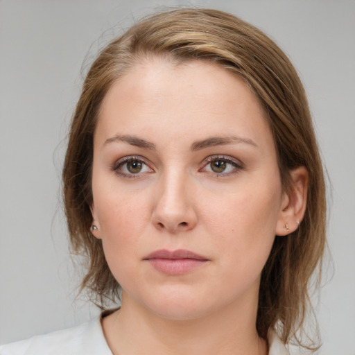 Neutral white young-adult female with medium  brown hair and grey eyes