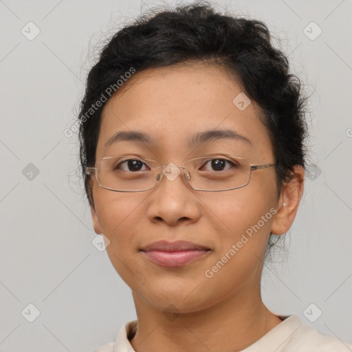 Joyful latino adult female with short  brown hair and brown eyes