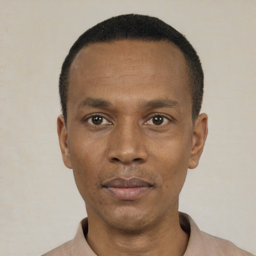 Neutral black young-adult male with short  black hair and brown eyes
