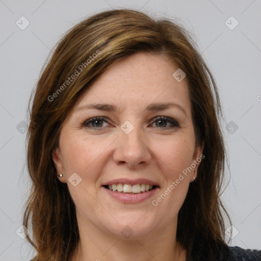 Joyful white young-adult female with long  brown hair and grey eyes