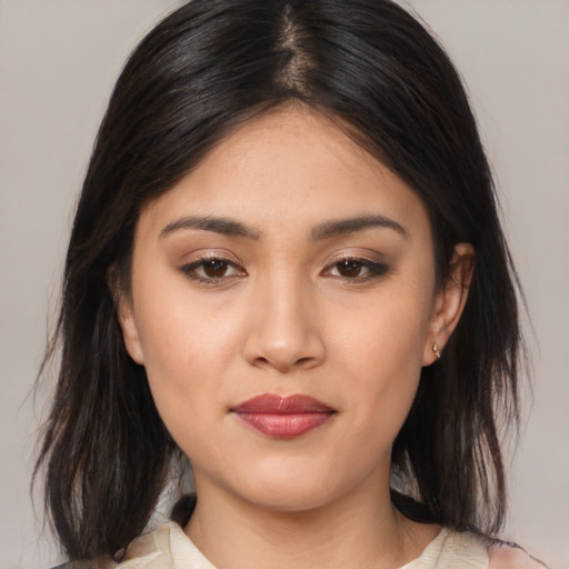 Neutral asian young-adult female with medium  brown hair and brown eyes