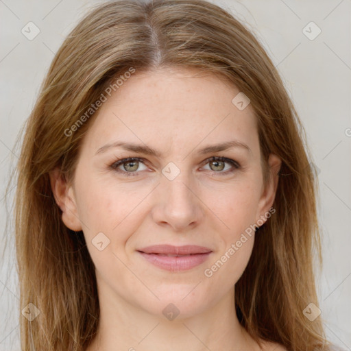 Joyful white young-adult female with long  brown hair and green eyes