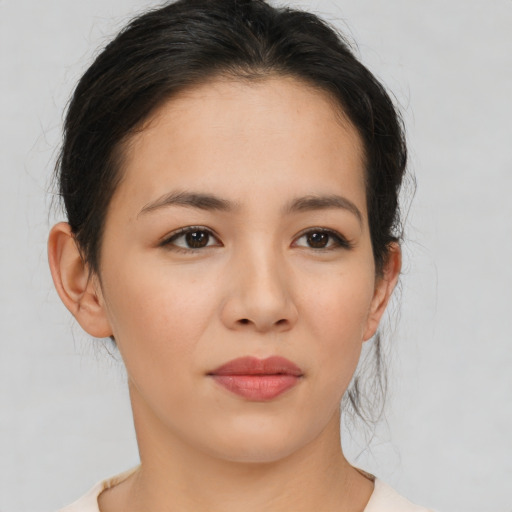 Neutral asian young-adult female with medium  brown hair and brown eyes