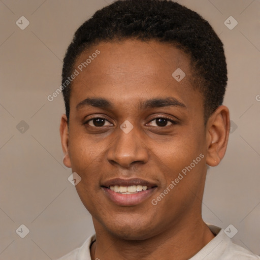 Joyful black young-adult male with short  black hair and brown eyes