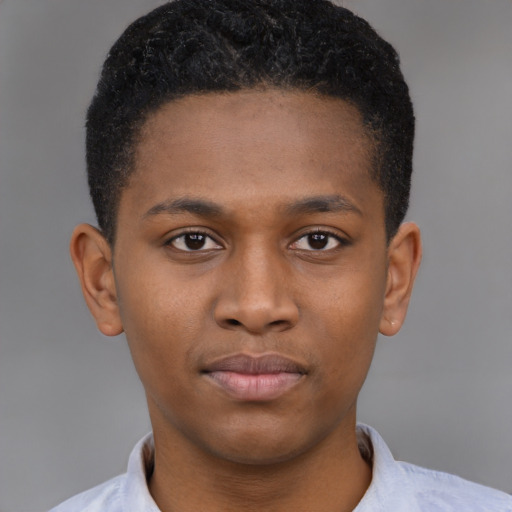 Neutral latino young-adult male with short  brown hair and brown eyes