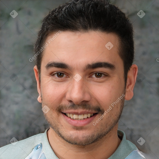 Joyful white young-adult male with short  black hair and brown eyes