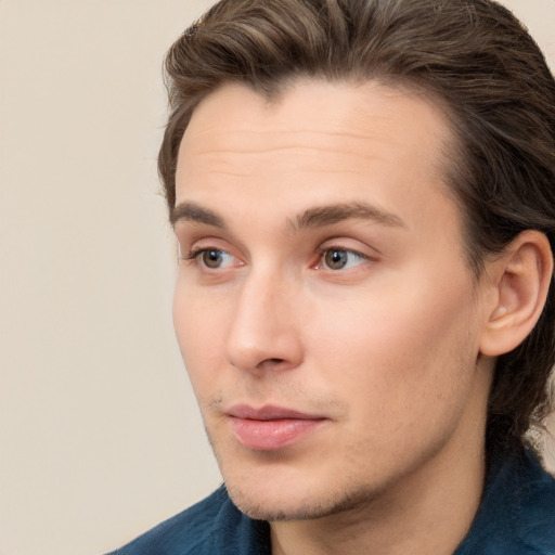 Neutral white young-adult male with medium  brown hair and brown eyes