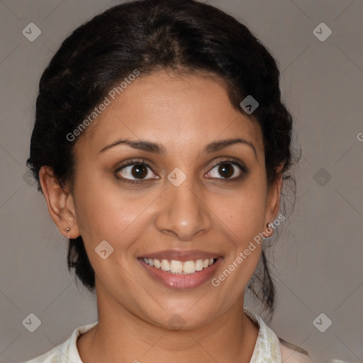 Joyful latino young-adult female with medium  brown hair and brown eyes