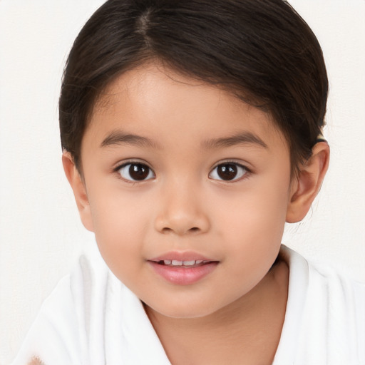 Joyful white child female with short  brown hair and brown eyes