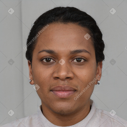 Joyful black young-adult female with short  black hair and brown eyes