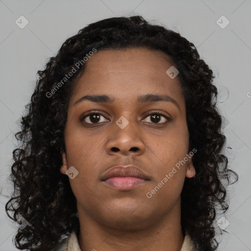 Neutral black young-adult female with long  brown hair and brown eyes