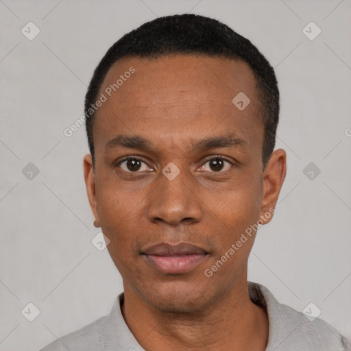 Neutral black young-adult male with short  black hair and brown eyes