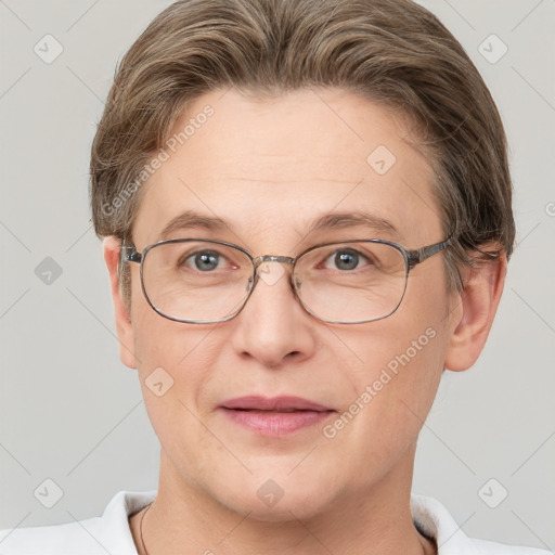 Joyful white adult female with short  brown hair and grey eyes