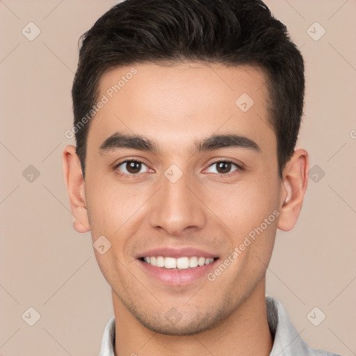 Joyful white young-adult male with short  brown hair and brown eyes