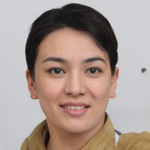 Joyful asian young-adult female with short  brown hair and brown eyes
