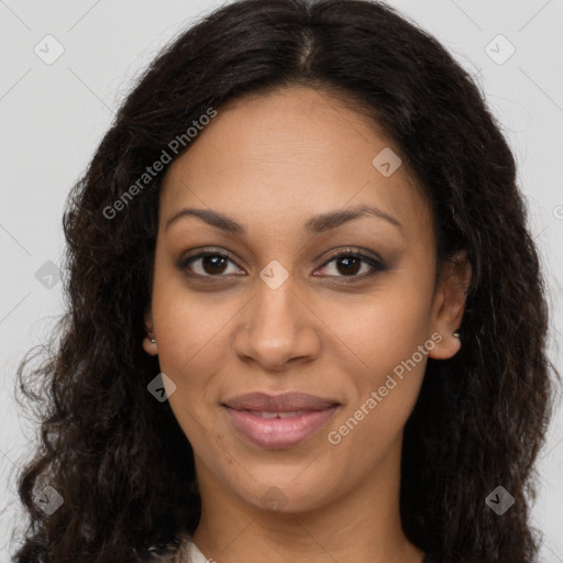 Joyful latino adult female with long  brown hair and brown eyes