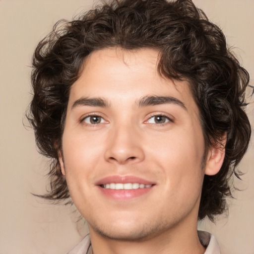 Joyful white young-adult male with medium  brown hair and brown eyes