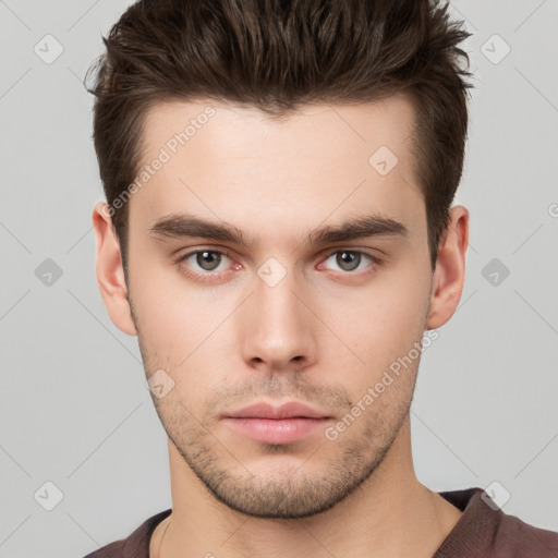 Neutral white young-adult male with short  brown hair and brown eyes