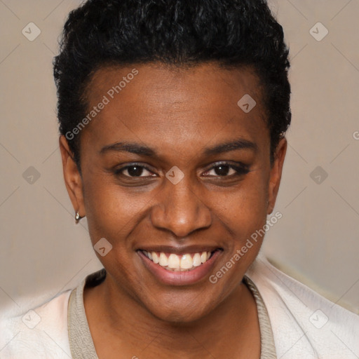 Joyful black young-adult female with short  brown hair and brown eyes