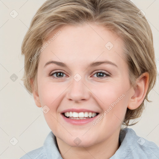 Joyful white young-adult female with medium  brown hair and blue eyes