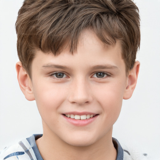 Joyful white child male with short  brown hair and brown eyes