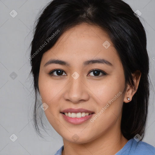 Joyful asian young-adult female with medium  brown hair and brown eyes