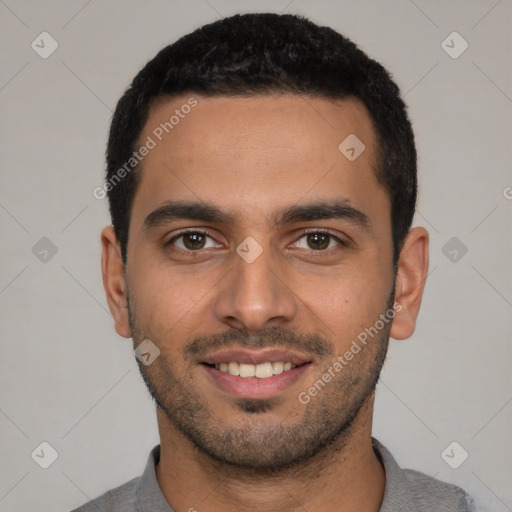 Joyful white young-adult male with short  black hair and brown eyes