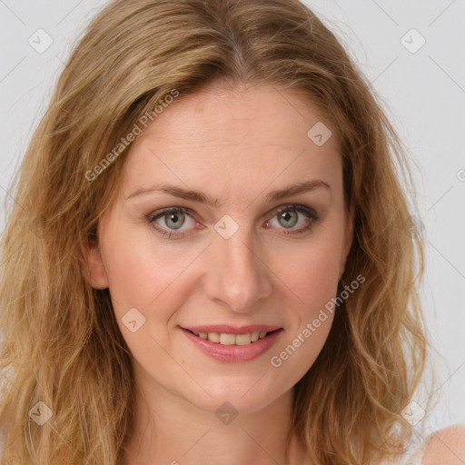 Joyful white young-adult female with long  brown hair and green eyes