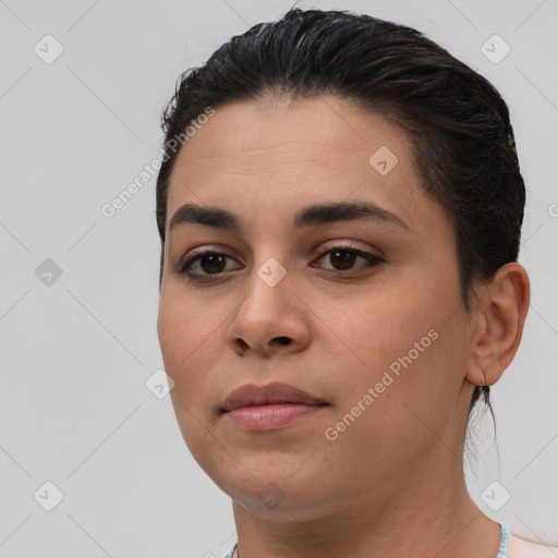 Neutral white young-adult female with short  brown hair and brown eyes