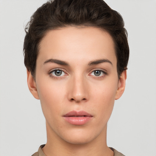 Neutral white young-adult female with short  brown hair and brown eyes