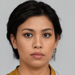 Neutral asian young-adult female with medium  black hair and brown eyes