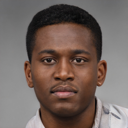 Neutral latino young-adult male with short  brown hair and brown eyes