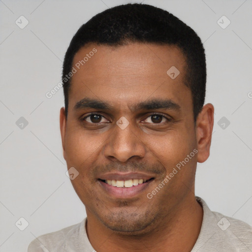 Joyful latino young-adult male with short  black hair and brown eyes