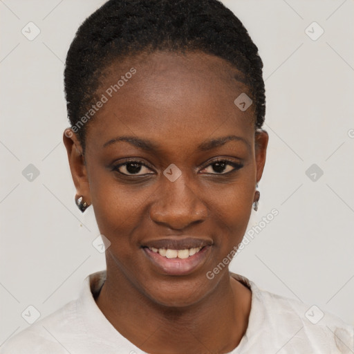 Joyful black young-adult female with short  black hair and brown eyes