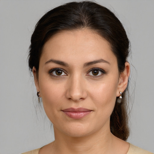 Joyful white young-adult female with medium  brown hair and brown eyes