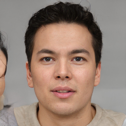 Neutral asian young-adult male with short  brown hair and brown eyes