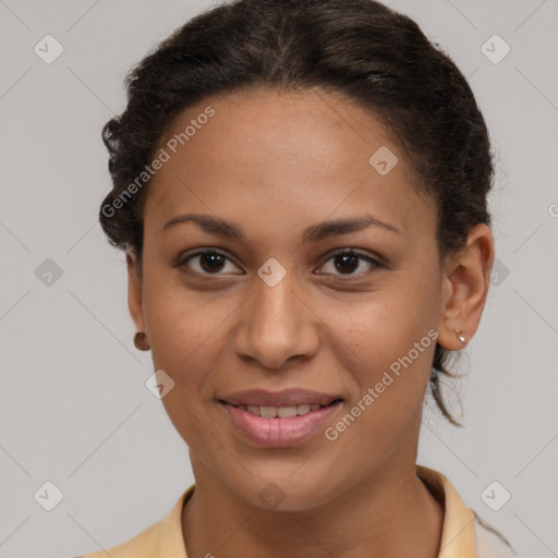 Joyful latino young-adult female with short  brown hair and brown eyes