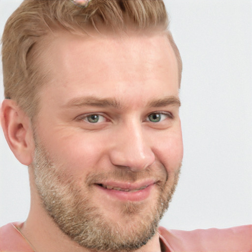 Joyful white young-adult male with short  brown hair and blue eyes